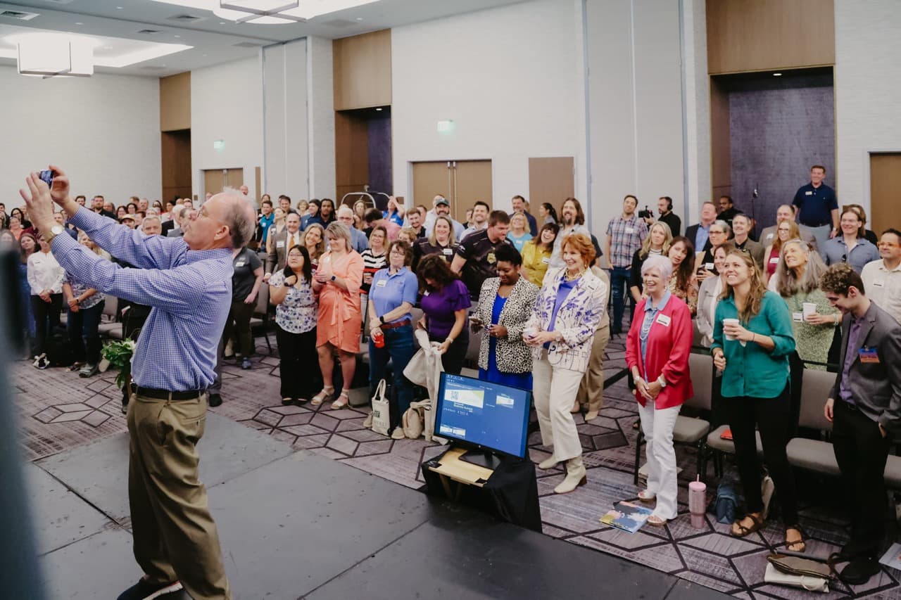 ActionCOACH group networking at a past retreat